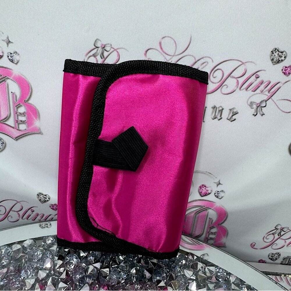 Jewelry holder travelling bag opens up and can hang pink tie dye inside plastic